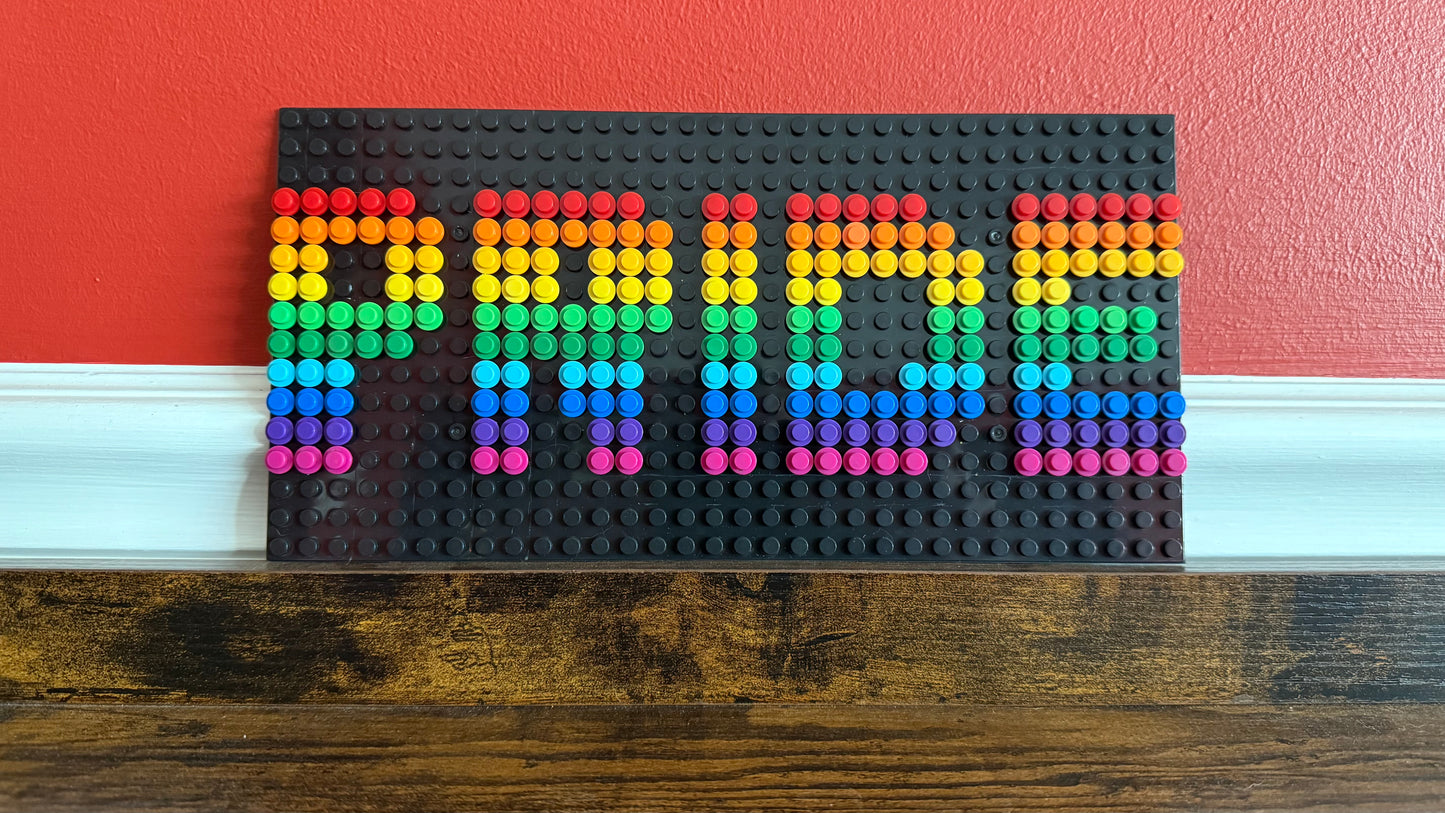 Build-It-Yourself DIY Pride Pixel Art Sign Kit – 32x16 Studs | Rainbow Mosaic on Black Base