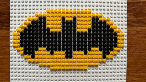 Batman Logo Brick Mosaic | 32x32 LEGO-Compatible Pixel Art | Handmade Superhero Wall Art | DC Comics Gift for Fans