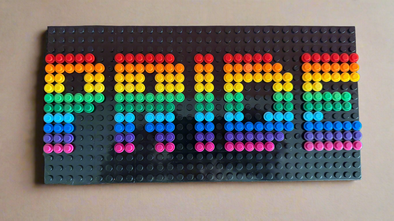 Build-It-Yourself DIY Pride Pixel Art Sign Kit – 32x16 Studs | Rainbow Mosaic on Black Base