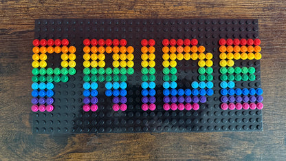 Build-It-Yourself DIY Pride Pixel Art Sign Kit – 32x16 Studs | Rainbow Mosaic on Black Base